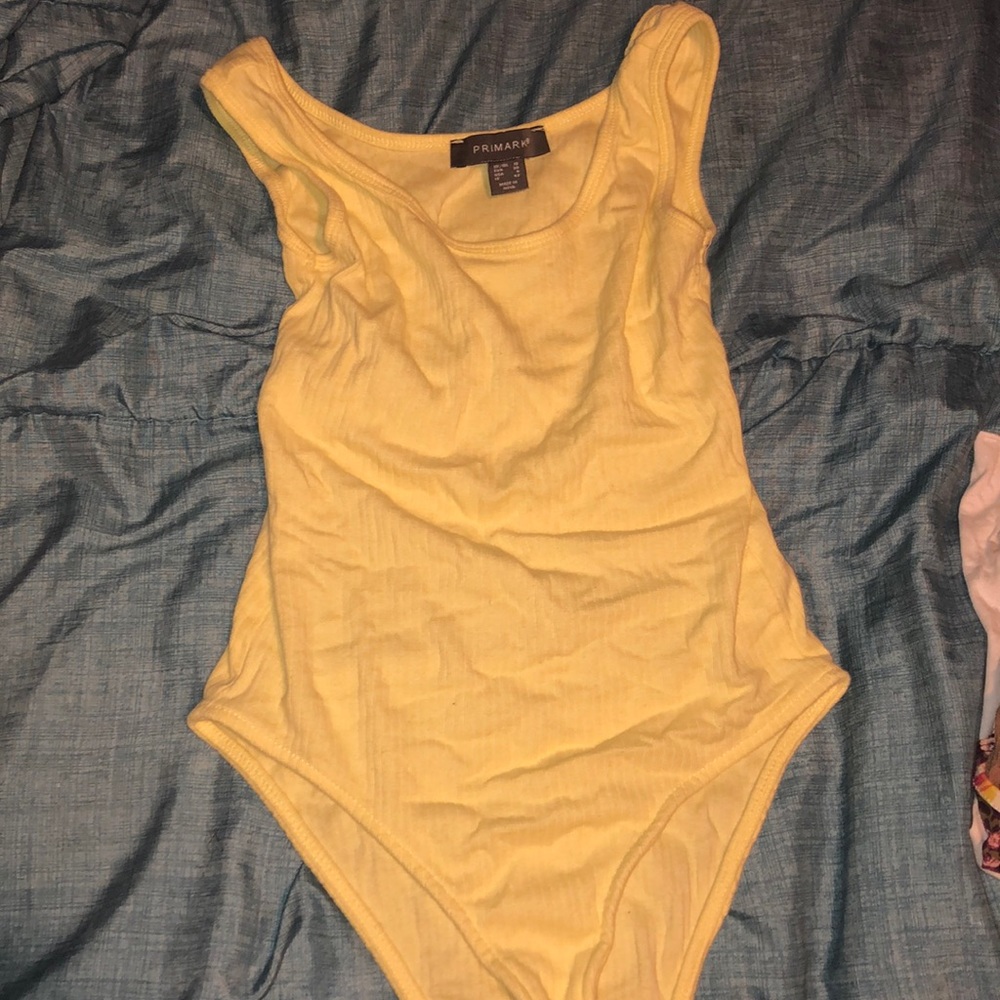 Yellow bodysuit